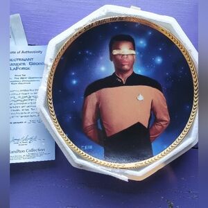 a plate with lieutenant Commander Geordie Laforge off of star trek.